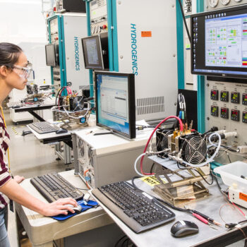 July 12, 2016 - NREL researcher Ami Yang Neyerlin runs fuel cell tests using the GM test stands in the Fuel Cell Development and Test Lab at the ESIF. (Photo by Dennis Schroeder / NREL